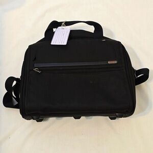 Authentic Tumi carryon luggage underseat bag with Trolley Sleeve BLACK, New